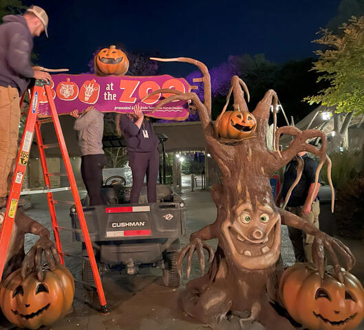 Hanging the custom-made entry sign