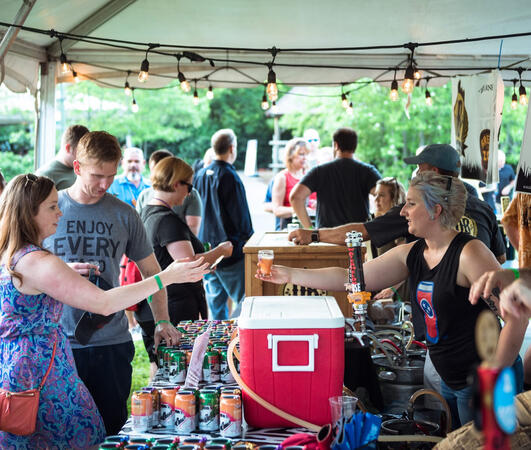 One of over 50 stations giving out alcohol samples at Brew at the Zoo