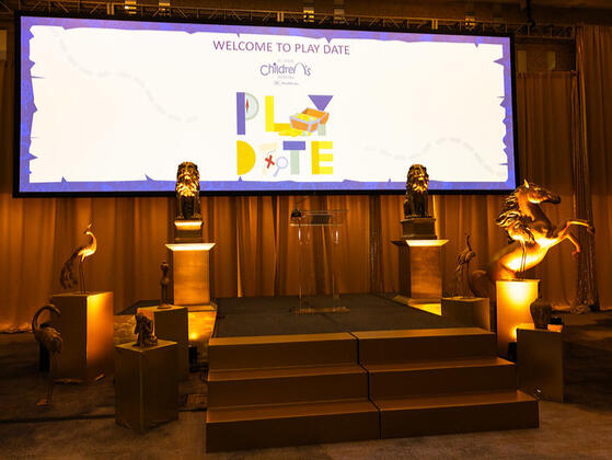 Ballroom stage with gold statues