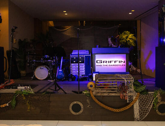 Band stage decorated to look like a ship dock