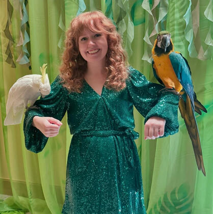 A local parrot rescue brought in ambassador birds for pictures with the guests