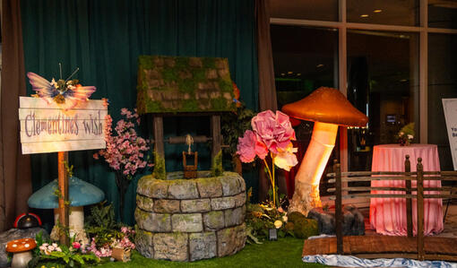 The wishing well gift card game. There was a magnet on the bottom of the bucket that would be lowered down into envelopes of gift cards that had magnets to be lifted up.