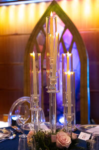 One of the centerpieces with a back-lit stained glass window behind